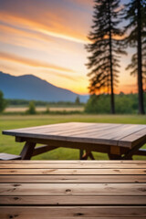 Empty wooden table with blurred evening campsite in the background, for product display