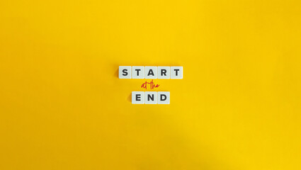 Start at the End Banner. Text on Block Letter Tiles on Yellow Background. Minimalist Aesthetic.