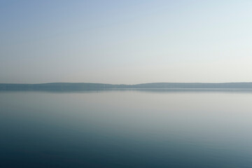 morning fog over the lake, horizon line