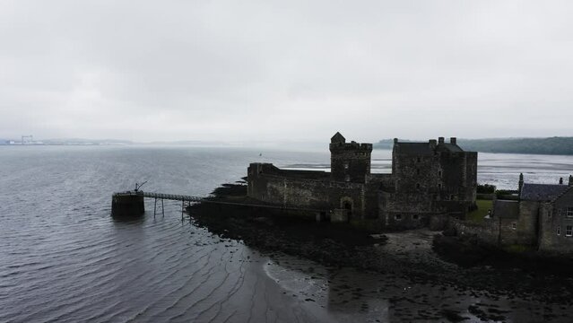 Drone shot of Blackness Castle on Scotland's coast.