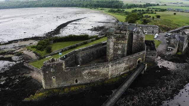 Drone shot over the famous Blackness Castle on Scotland's coast.