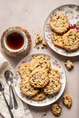 Homemade chocolate rustic biscuits and a cup of tea.  Top View.