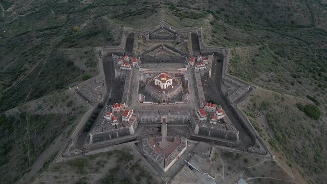 Drone footage over the Fortress of Nossa Senhora da Graca at sunrise in Elvas, Portugal