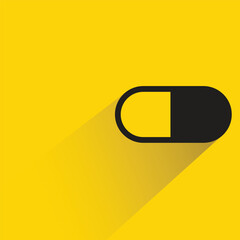 capsule with shadow on yellow background