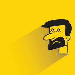 beard man with shadow on yellow background