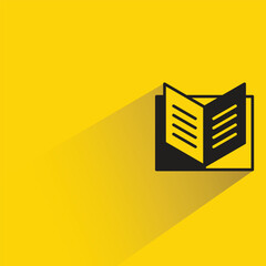 book icon with shadow on yellow background