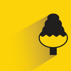 Christmas tree icon with shadow on yellow background