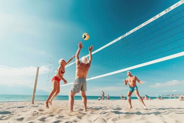 Active senior men playing volleyball on a sunny beach