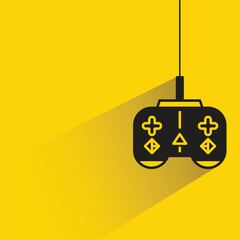 game joystick icon with shadow on yellow background