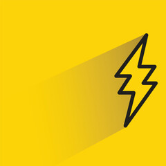 thunder bolt with shadow on yellow background
