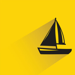 sailing boat with shadow on yellow background