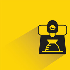 coffee machine icon with shadow on yellow background