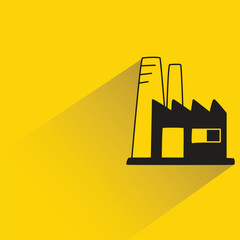 factory icon with shadow on yellow background