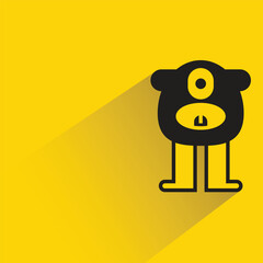 cute monster character with shadow on yellow background
