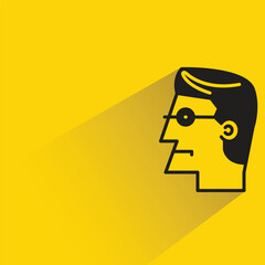 male face icon with shadow on yellow background