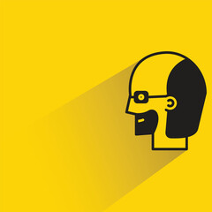 bald man icon with shadow on yellow background