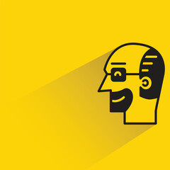 bald man icon with shadow on yellow background