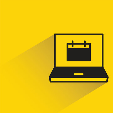 laptop and calendar icon with shadow on yellow background