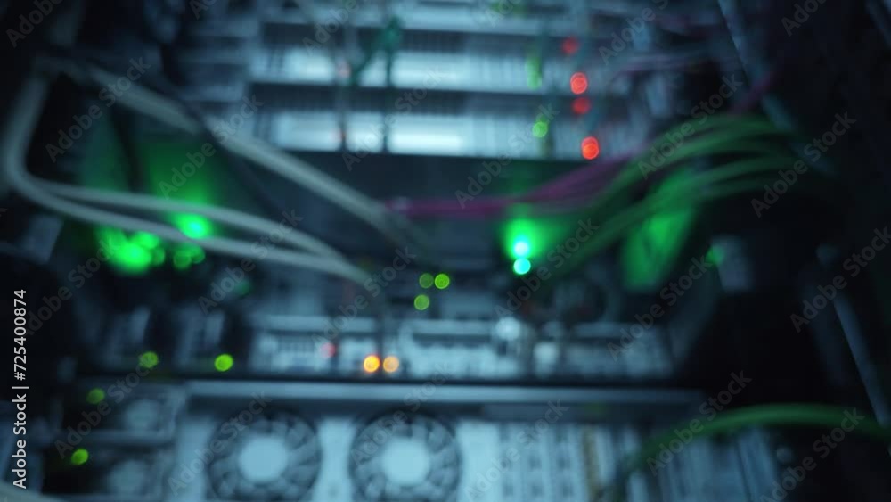 Poster server rack from bottom to top, camera in motion. blurred server.