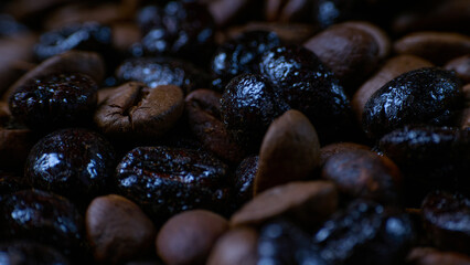 Coffee beans of varying degrees of roasting. Macro. Close- up.