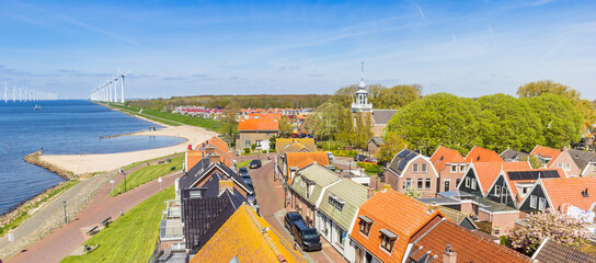 Panoramic view over the IJsselmeer lake and historic town Urk, Netherlands - obrazy, fototapety, plakaty