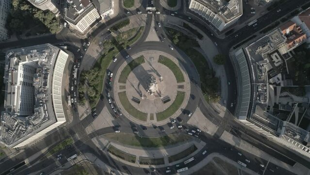 Drone flyover of busy round about of Marques de Pombal in Lisbon Portugal