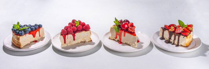 Summer cheesecake slices with various berry