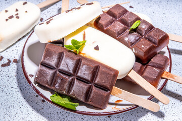 Chocolate and vanilla popsicles