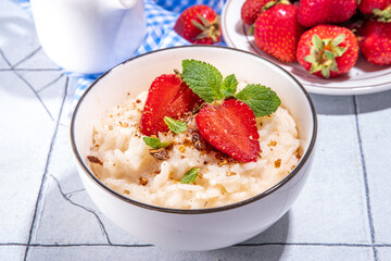 Rice porridge or pudding with strawberry
