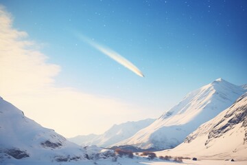 comet passing over a snow covered mountainous landscape