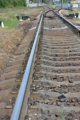 Fototapeta na wymiar Railway tracks, electric lines, metal rails on which electric trains run, trains by Ukrainian railway.