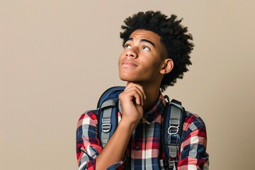 a man with backpack looking up - obrazy, fototapety, plakaty