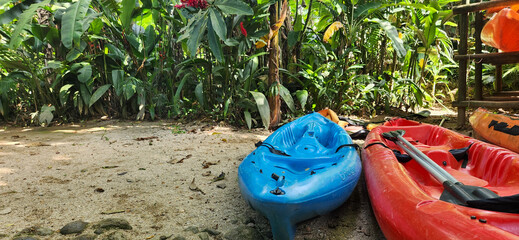 red kayak on a day in a tropical forest in Brazil, amidst nature and lots of greenery