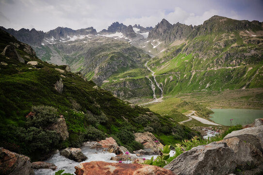 Steingletscher and stream running through mountains, Susten Pass, Urner Alps, Switzerland