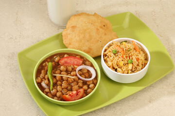 Punjabi Chana Masala With Veg Pulao and Puri, Lassi