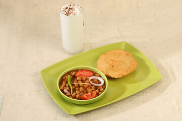 Punjabi Chana Masala With Puri and Lassi