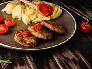 grandma cooked cutlets with mashed potatoes