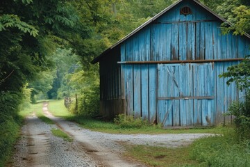 Fototapeta na wymiar Rustic Blue Barn Shed with Weathered Wooden Door and Gravel Driveway