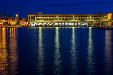 Dusk and night in Trieste. Between historic buildings and the sea.