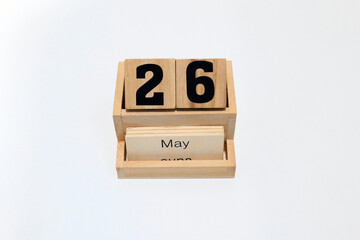 26th of May wooden perpetual calendar. Shot close up isolated on a white background