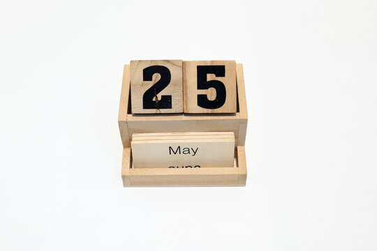 25th of May wooden perpetual calendar. Shot close up isolated on a white background