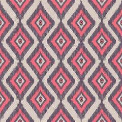 African Ikat seamless pattern embroidery on pink background.geometric ikat ethnic oriental pattern traditional. Design for ethnic, batik, textiles, home decor, and graphic design.
