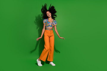 Full length photo of a positive lady flying hair in air after perfect new lotion shampoo for...