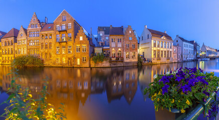 Medieval houses on quay of Leie river at night, Old Town of Ghent, Belgium