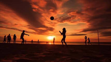Silhouettes of beach volleyball players on the beach at beautiful sunset. Beach sports, holiday...