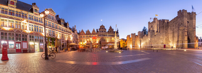 Fototapeta na wymiar Panoramic view of Sint-Veerleplein, St Veerle Square, and Gravensteen at night, Ghent, Belgium