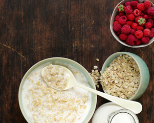 healthy breakfast with whole grain porridge and fresh berries