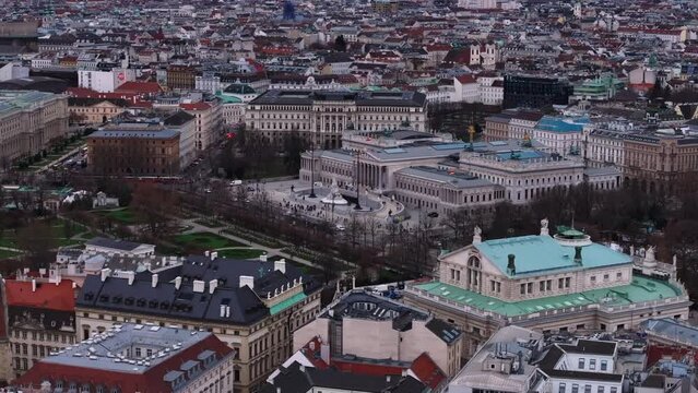 Aerial shot of historic buildings and palaces in city center. Tourist sights in metropolis. Austrian Parliament. Vienna, Austria