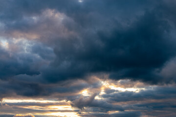 Beautiful moody sky with dark clouds at sunset, sky remplacement, nature background