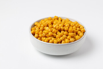 Traditional oriental dish roasted chickpeas in a light bowl on  white background isolated